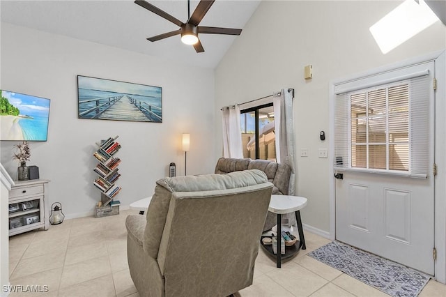 13366 Fox Chapel Ct, Fort Myers, FL 33919 - living room with light tile patterned floors, high vaulted ceiling, and ceiling fan