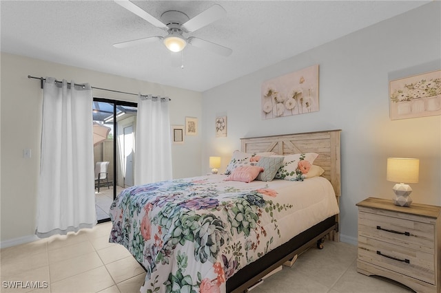 bedroom with access to outside, a textured ceiling, light tile patterned floors, and ceiling fan