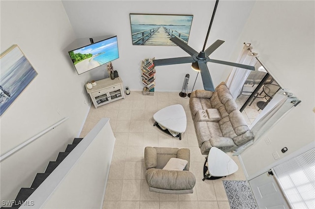 13366 Fox Chapel Ct, Fort Myers, FL 33919 - tiled living room with healthy amount of natural light and ceiling fan
