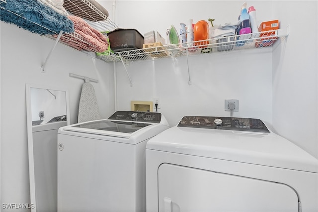 laundry room featuring washer and dryer