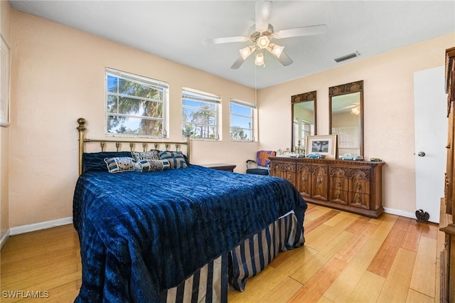 bedroom featuring ceiling fan and light hardwood / wood-style floors