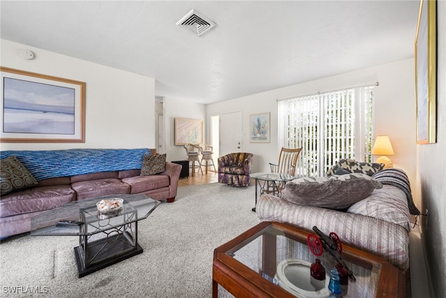 living room featuring carpet flooring