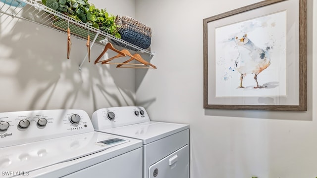 washroom with washer and clothes dryer