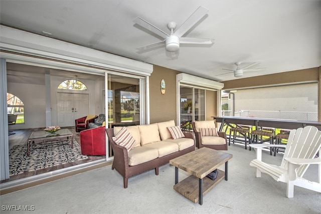 sunroom / solarium with ceiling fan