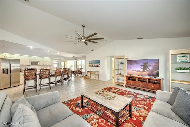 tiled living room featuring vaulted ceiling and ceiling fan