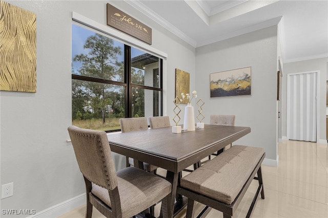 tiled dining room with ornamental molding