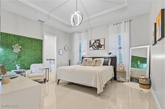 tiled bedroom featuring ornamental molding, multiple windows, and a tray ceiling