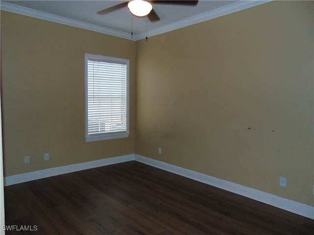 empty room with ceiling fan, dark hardwood / wood-style floors, and crown molding