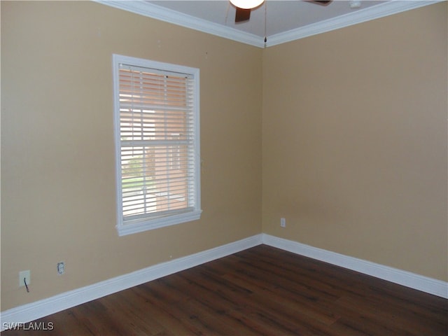 empty room featuring ornamental molding, ceiling fan, and dark hardwood / wood-style floors