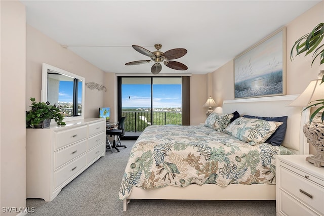 carpeted bedroom featuring access to outside and ceiling fan