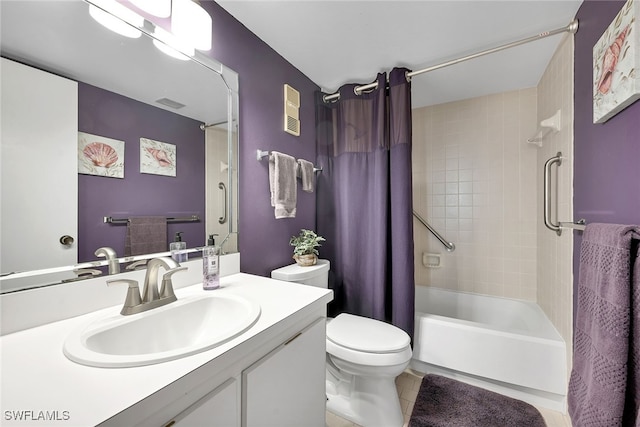 full bathroom featuring toilet, shower / bath combo, vanity, and tile patterned floors