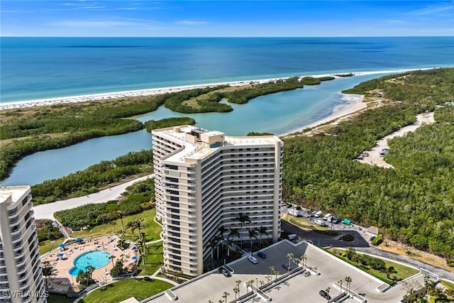 bird's eye view featuring a beach view and a water view