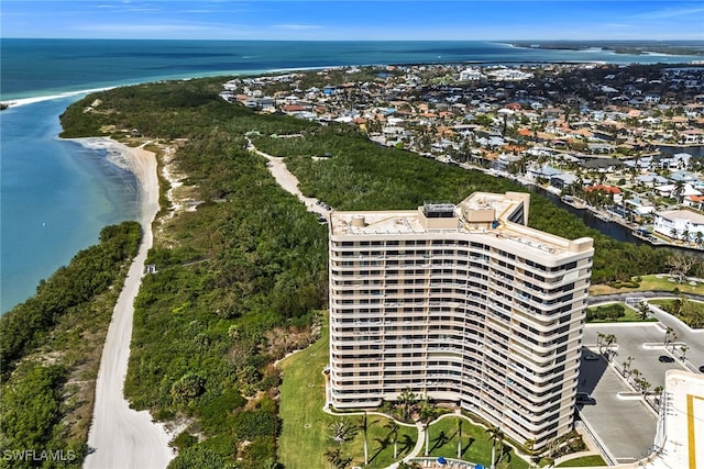 aerial view with a view of the beach and a water view