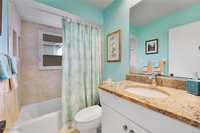 full bathroom featuring toilet, vanity, and shower / tub combo