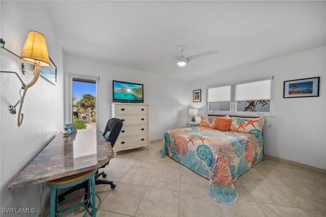 bedroom featuring ceiling fan and light tile patterned flooring