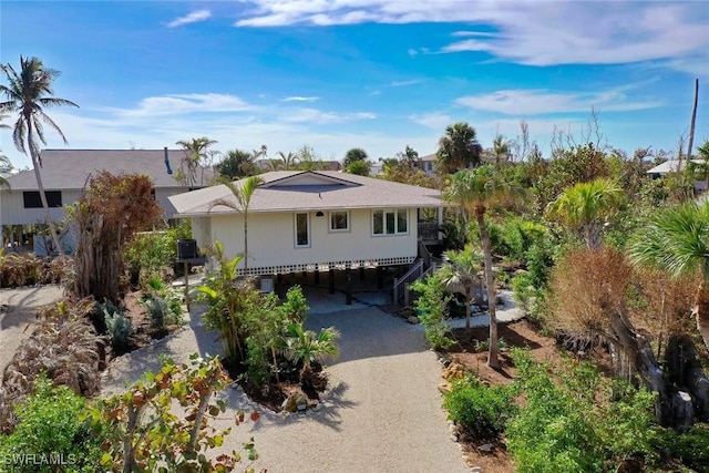 view of front of home featuring a carport