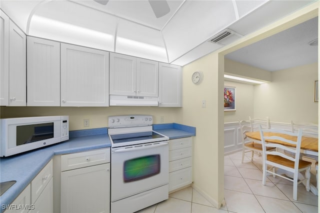 kitchen with white appliances, ceiling fan, white cabinetry, and light tile patterned floors