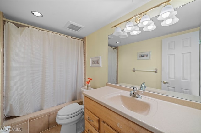 full bathroom featuring shower / bath combo, vanity, tile patterned floors, and toilet