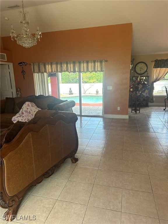 tiled living room with lofted ceiling