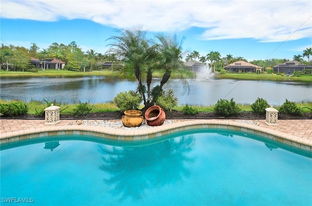 view of pool featuring a water view