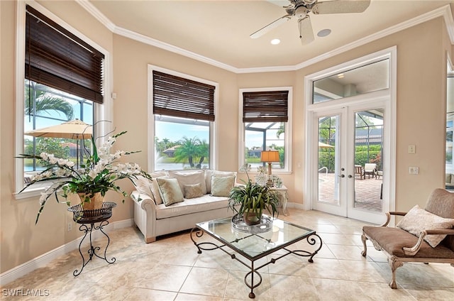 interior space featuring french doors, light tile patterned floors, ceiling fan, and crown molding