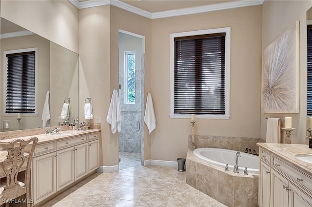 bathroom with tile patterned floors, vanity, ornamental molding, and shower with separate bathtub