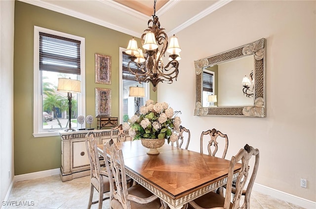 dining room featuring light tile patterned floors, a chandelier, and ornamental molding