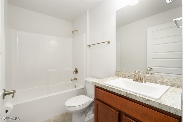 full bathroom featuring washtub / shower combination, vanity, toilet, and tile patterned flooring