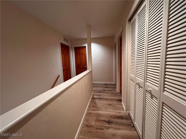 hall featuring light hardwood / wood-style flooring