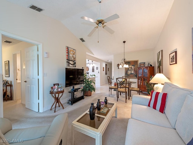 living room with light carpet, ceiling fan with notable chandelier, and lofted ceiling