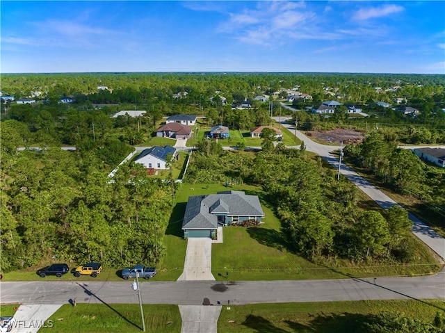 3002 40th St W, Lehigh Acres, FL 33971 - aerial view of property and surrounding area featuring nearby suburban area