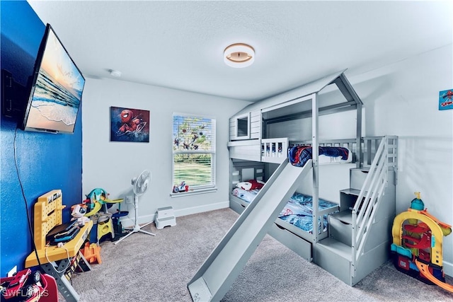 3002 40th St W, Lehigh Acres, FL 33971 - bedroom with carpet floors, baseboards, and a textured ceiling