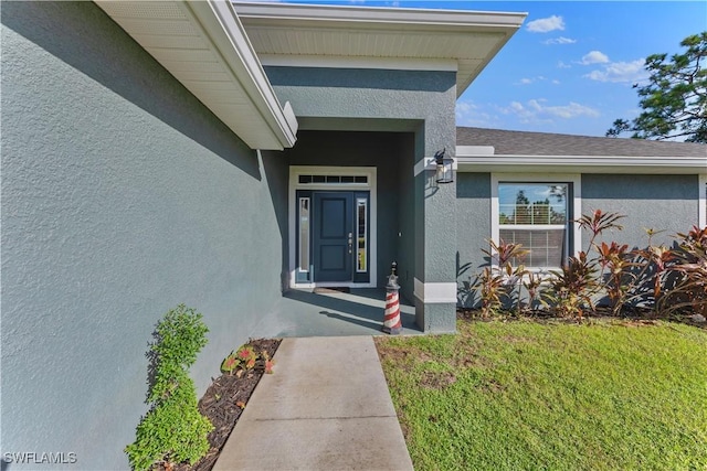 3002 40th St W, Lehigh Acres, FL 33971 - entrance to property with stucco siding and a lawn