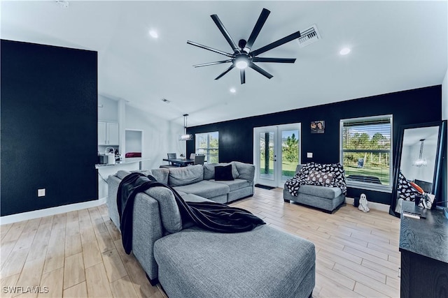 3002 40th St W, Lehigh Acres, FL 33971 - living area with vaulted ceiling, light wood-style floors, a ceiling fan, french doors, and recessed lighting