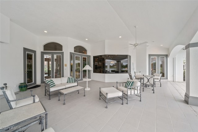 view of patio with french doors, ceiling fan, and an outdoor hangout area