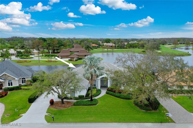 drone / aerial view with a water view