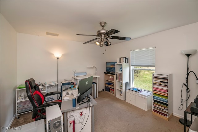 office area featuring carpet flooring and ceiling fan