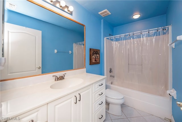 full bathroom featuring tile patterned flooring, vanity, toilet, and shower / bathtub combination with curtain