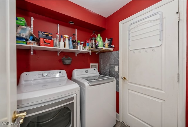 laundry room featuring washer and clothes dryer