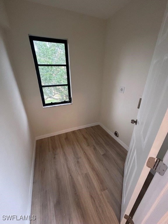 unfurnished room featuring hardwood / wood-style floors