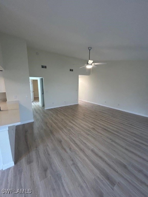 unfurnished living room with hardwood / wood-style floors and ceiling fan