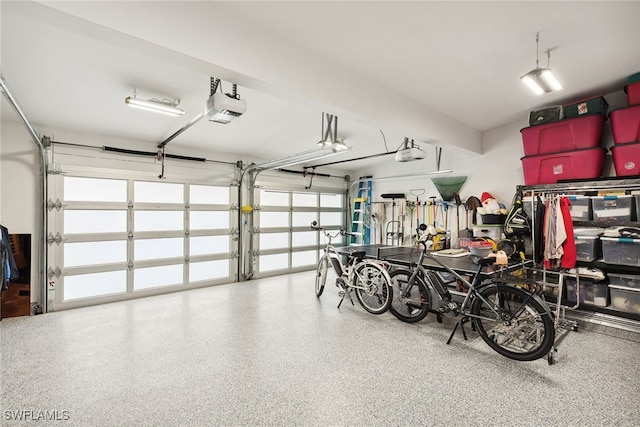 garage featuring a garage door opener