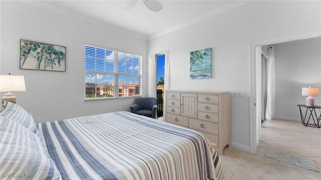 bedroom with ceiling fan, crown molding, and light colored carpet