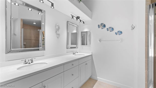 bathroom featuring vanity, tile patterned floors, and an enclosed shower