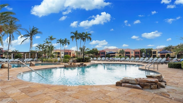 view of pool featuring a patio area