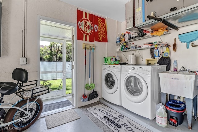 washroom with independent washer and dryer