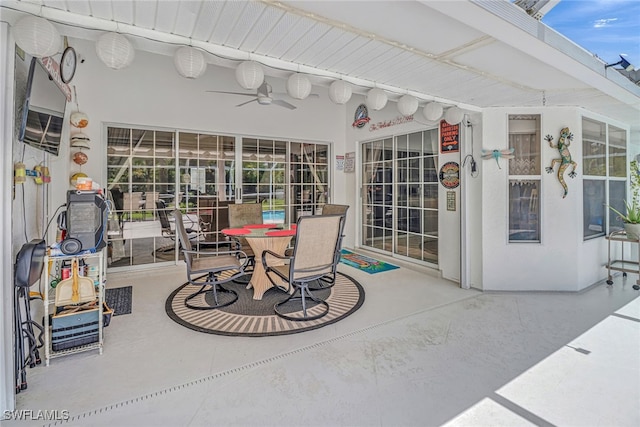 view of patio featuring ceiling fan