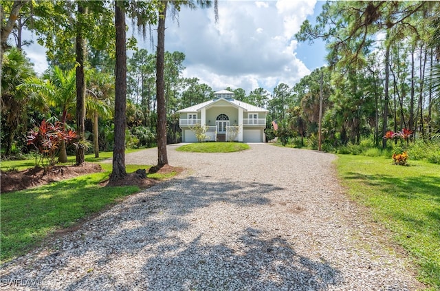 ranch-style house with a front lawn