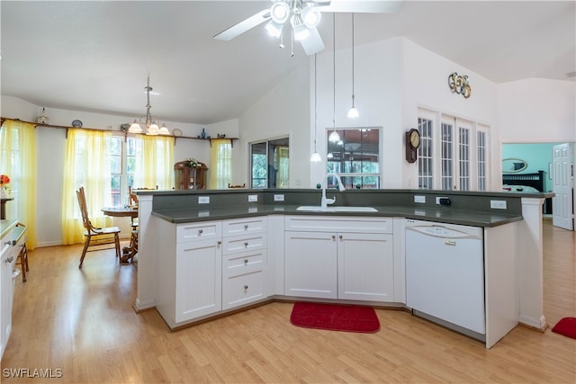 kitchen featuring white cabinets, light hardwood / wood-style floors, sink, and white dishwasher