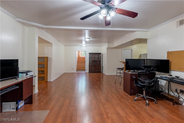 office area featuring ornamental molding, ceiling fan, and light hardwood / wood-style flooring